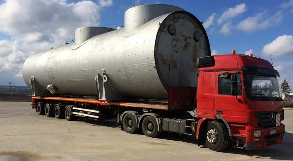 Перевозка негабаритных емкостей и цистерн на трале стоимость услуг и где заказать - Черкесск