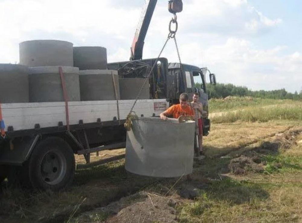 Перевозка бетонных колец и колодцев манипулятором стоимость услуг и где заказать - Черкесск